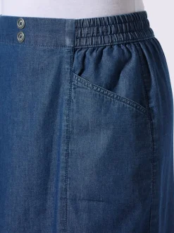 Jupe en jean poches en biais
