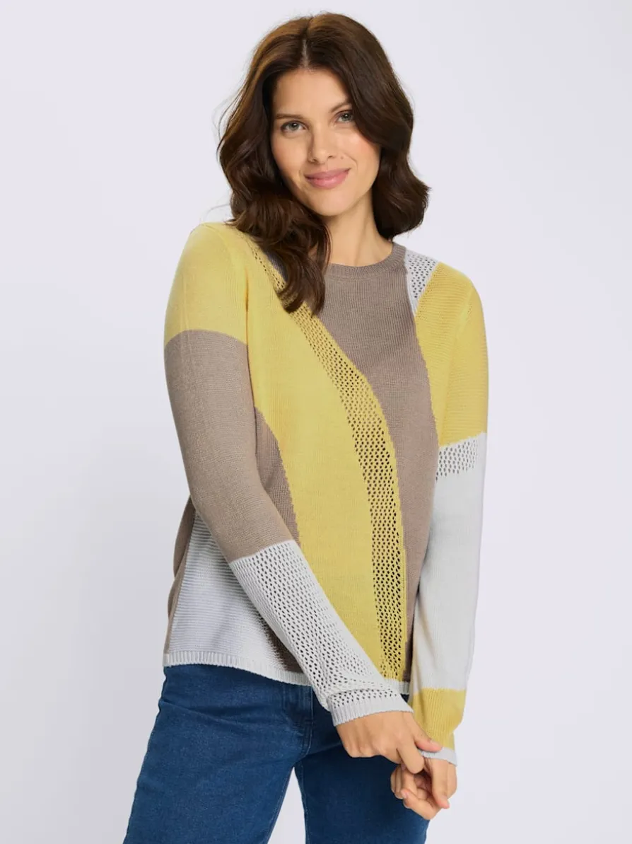 Pull ajouré motif tricoté avec partie ajourée devant