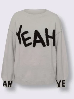 Pull en tricot inscription tendance