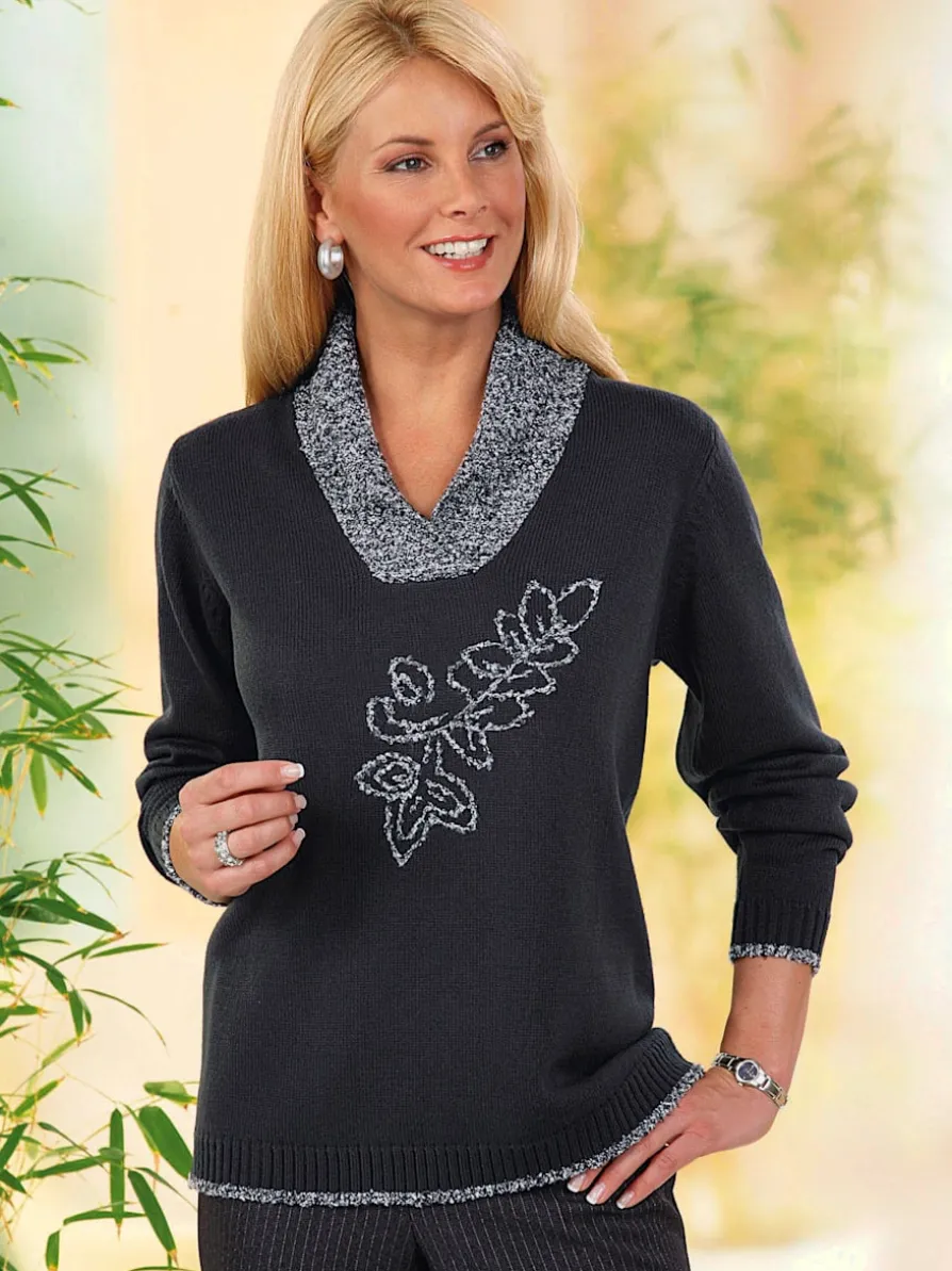 Pull féminin avec détails de broderie brillante