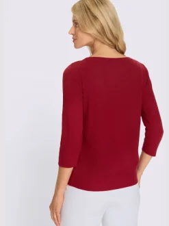 Pull à manches 3/4 découpes raffinées