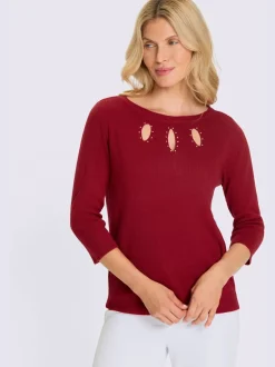 Pull à manches 3/4 découpes raffinées
