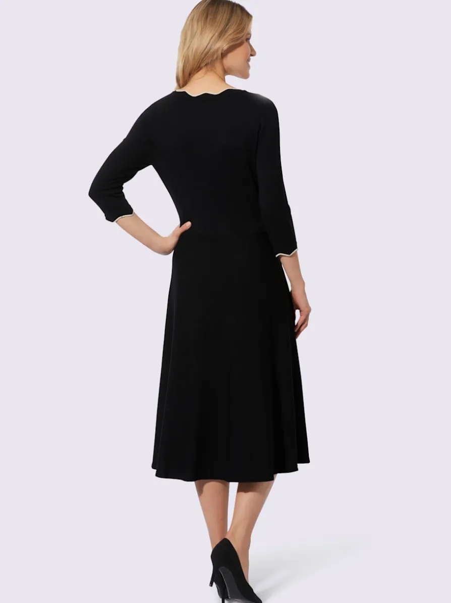 Robe en tricot bord ondulé élégant à l'encolure