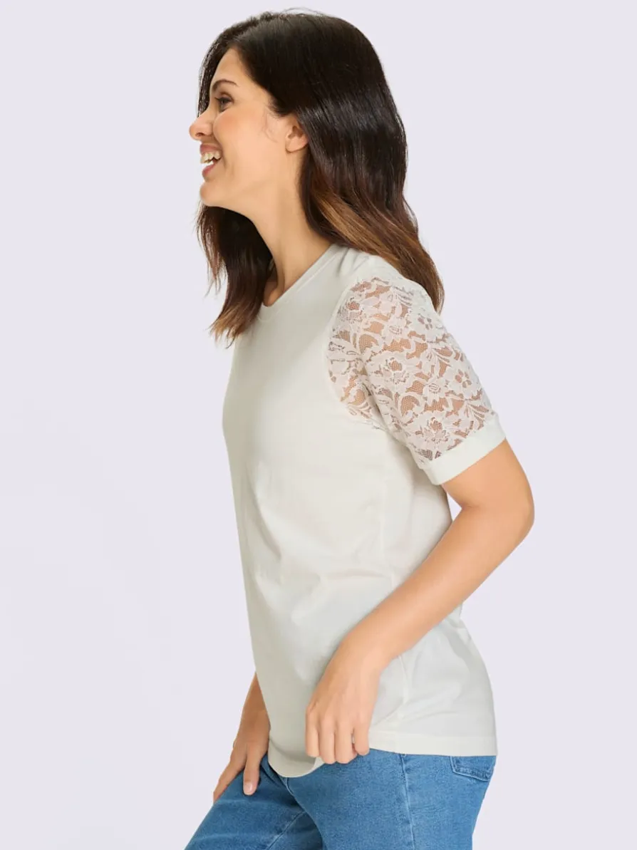 T-shirt en dentelle manches bouffantes discrètes
