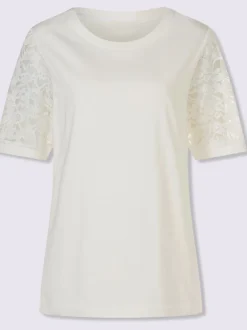T-shirt en dentelle manches bouffantes discrètes