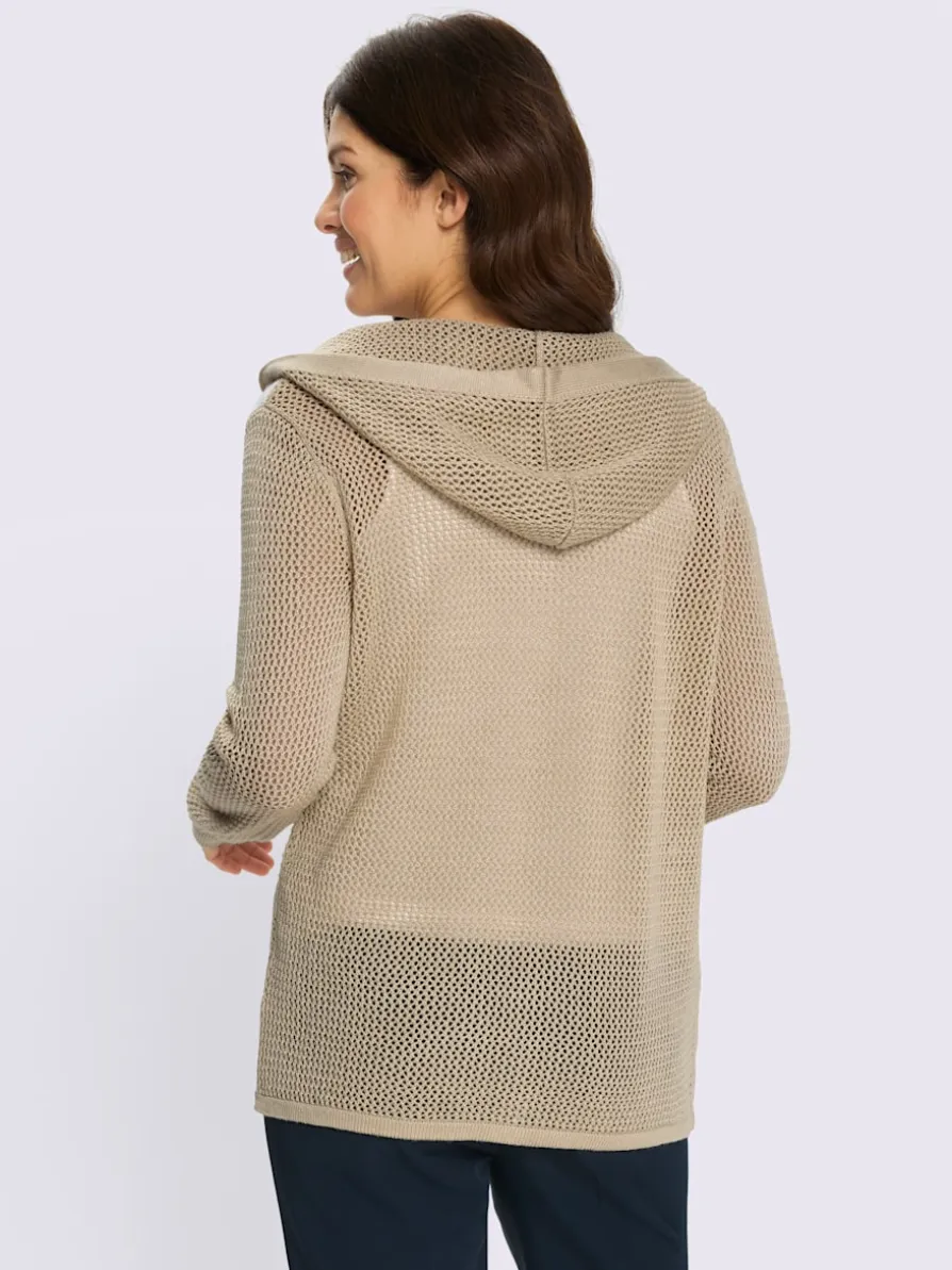 Veste en tricot ajouré à capuche