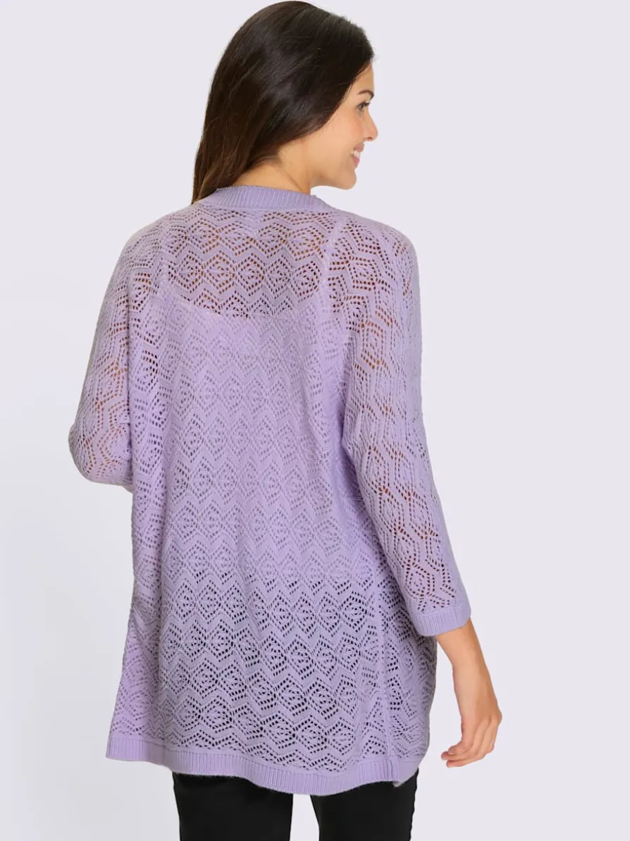 Veste en tricot ajouré coupe ouverte affinante