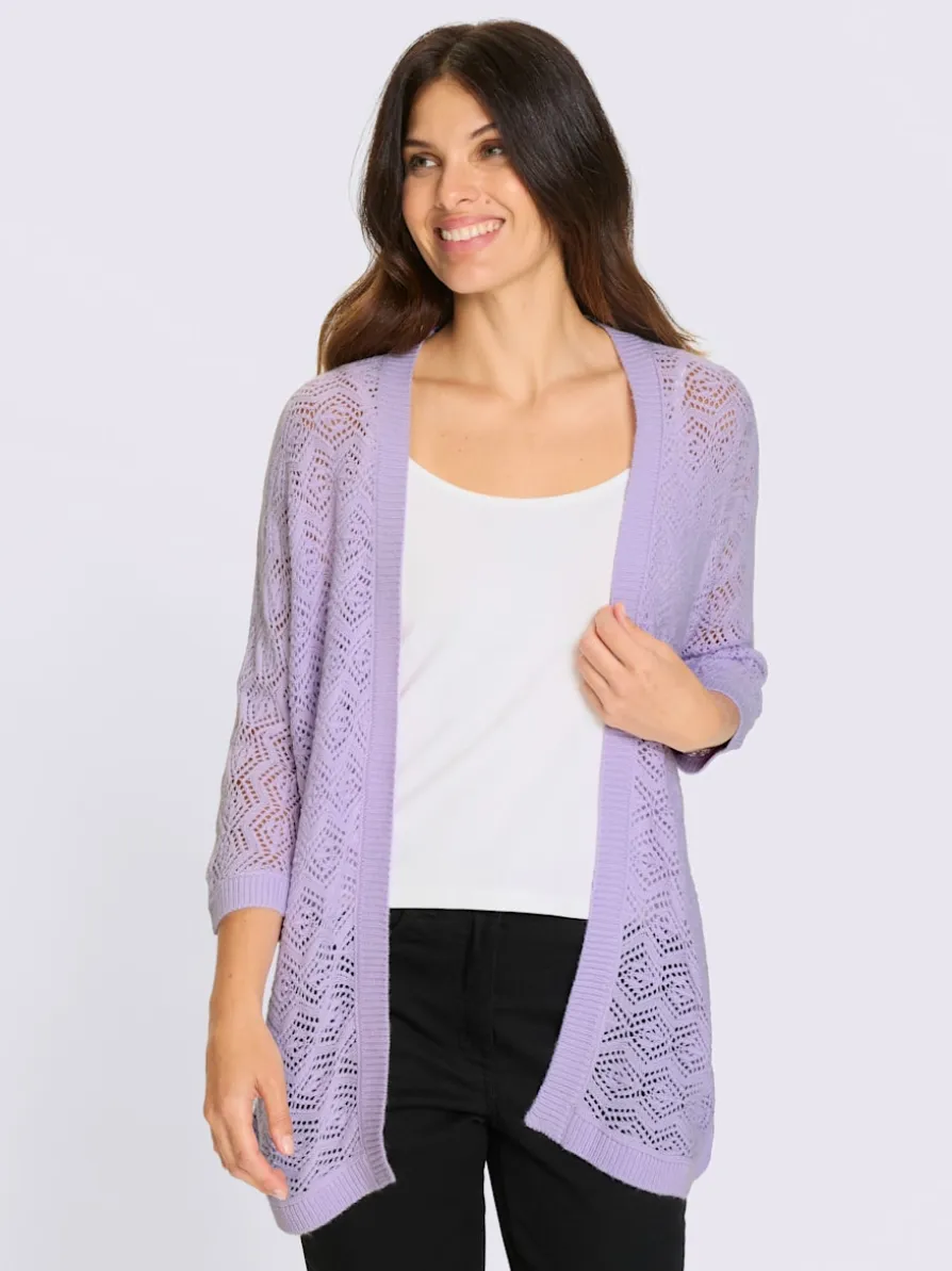Veste en tricot ajouré coupe ouverte affinante