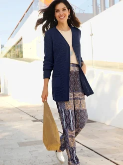 Veste longue en tricot coupe ouverte affinante